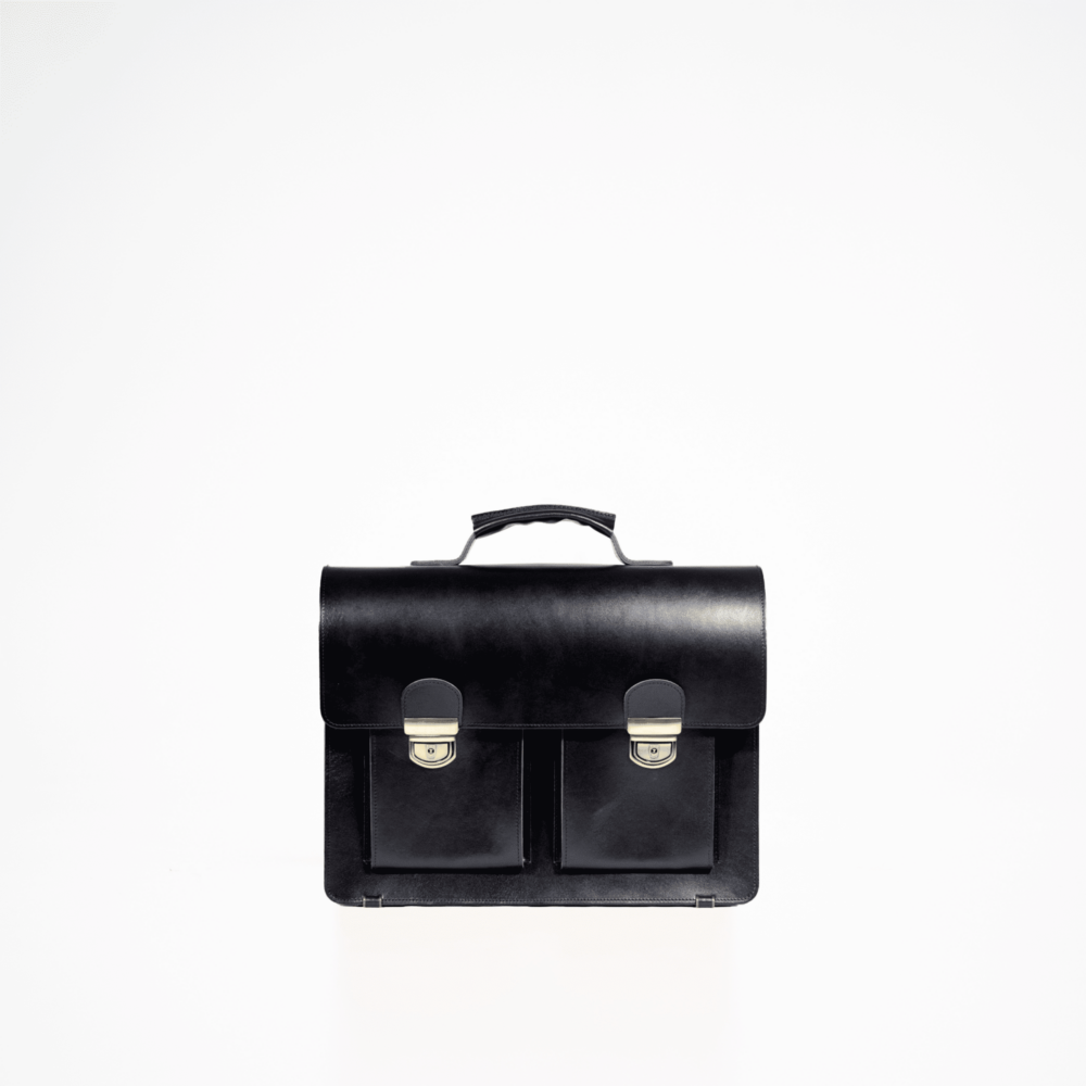 a black briefcase sitting on top of a white table.