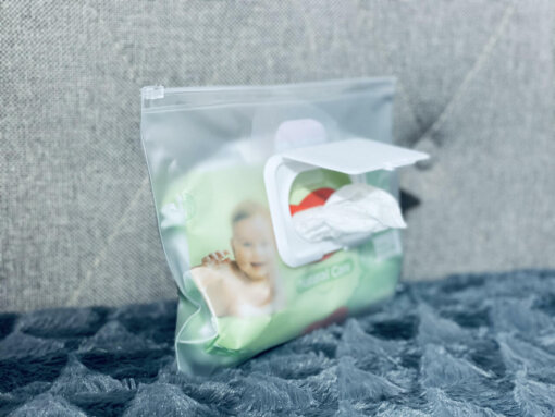 a plastic bag with a picture of a baby in it.