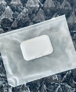 a clear plastic bag with a white plastic lid.