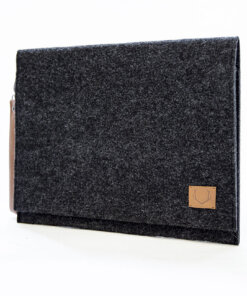 a black felt case with a brown leather label.