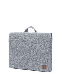 a gray laptop bag sitting on top of a white surface.