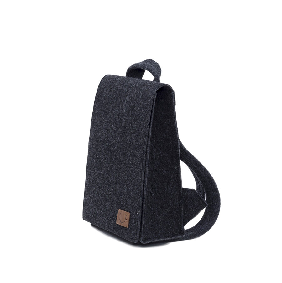 a black backpack sitting on top of a white background.