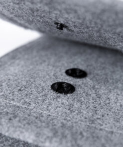 a close up of two buttons on a surface.
