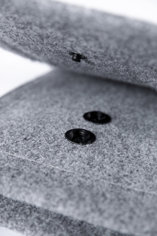 a close up of two buttons on a surface.