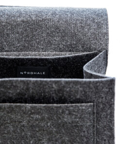 a close up of a gray chair with a label on it.