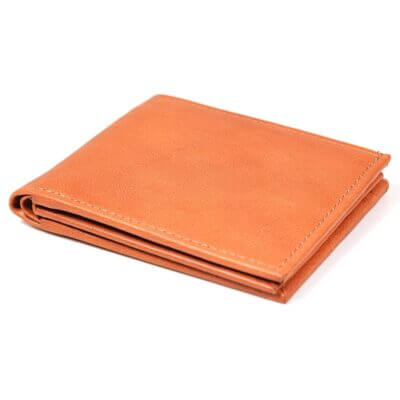 a tan leather wallet on a white background.