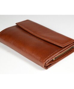 a brown leather wallet sitting on top of a white table.