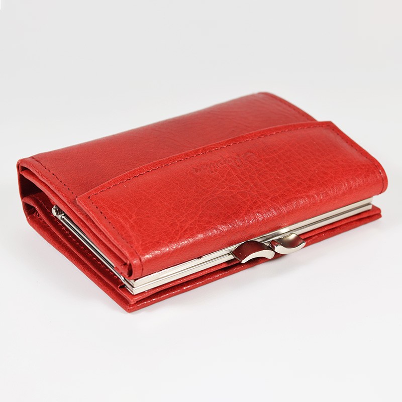 a red leather wallet is open on a white surface.