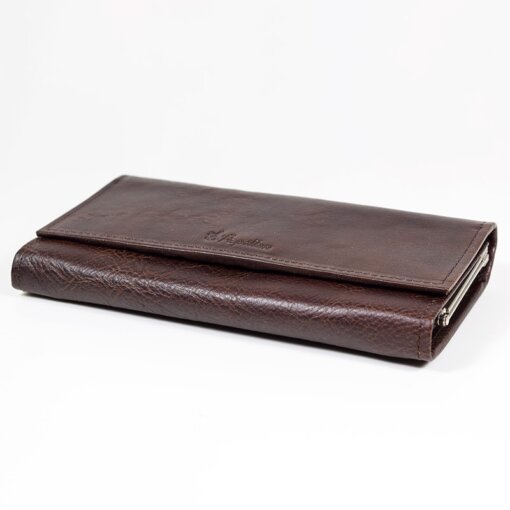 a brown wallet sitting on top of a white table.