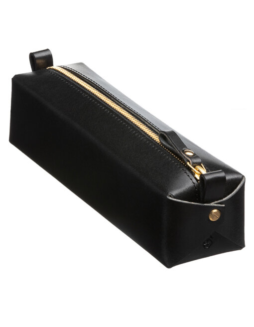 a black leather case with a gold zipper.