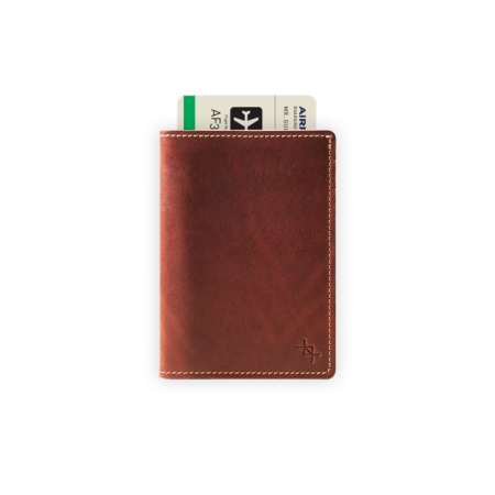 a brown wallet with a credit card in it.