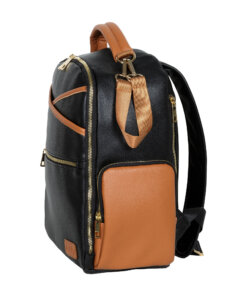 a black and tan backpack with a bow on the front.