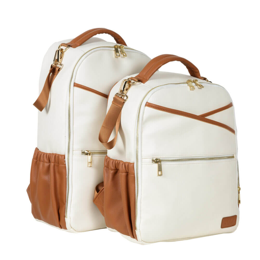 a pair of white backpacks sitting next to each other.