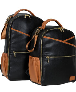 a pair of black and tan backpacks sitting next to each other.
