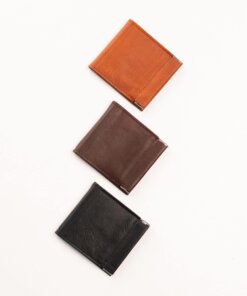 three different colors of leather on a white background.