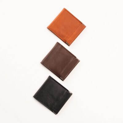 three different colors of leather on a white background.