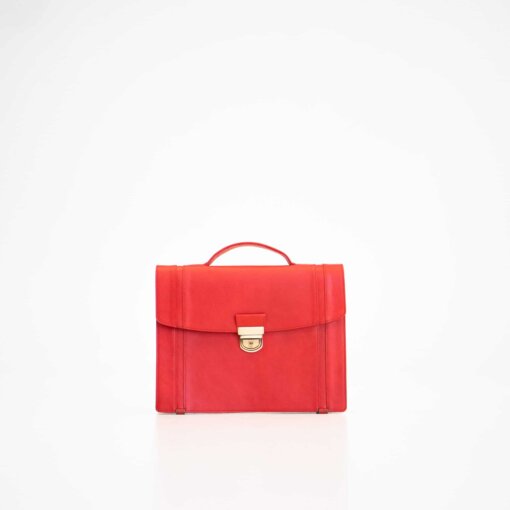 Un maletín rojo sobre un fondo blanco.