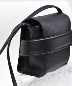 A black leather Shoulder bag Luce with a strap.