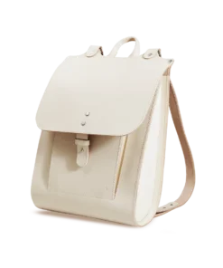 A white Great Rucksack - Cookie with a leather strap.
